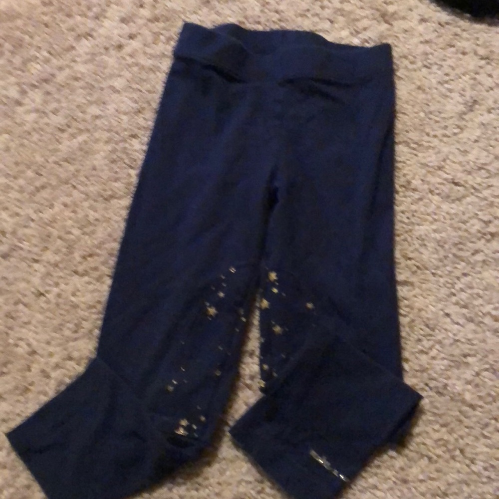 Navy leggings with gold stars on legs